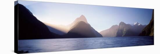 Mountain Range at Water's Edge, Milford Sound, Fiordland National Park, South Island, New Zealand-null-Stretched Canvas