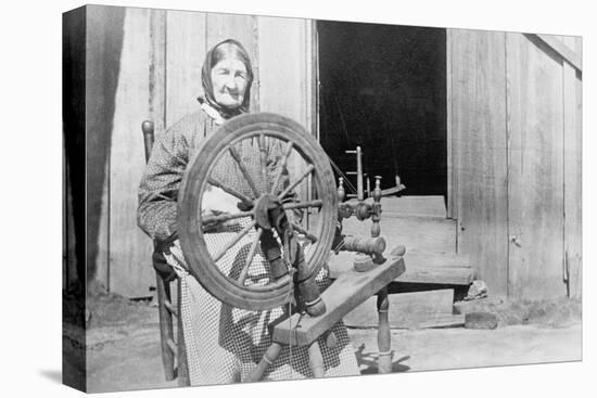 Mountain Women at a Spinning Wheel-null-Stretched Canvas