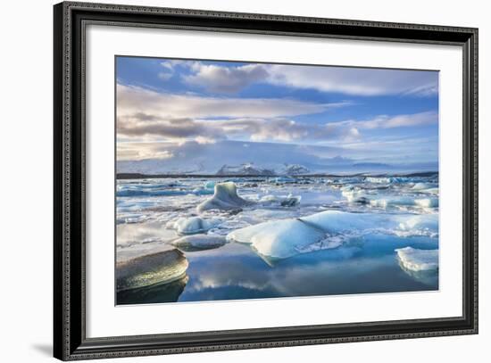 Mountains Behind Icebergs Locked in the Frozen Water of Jokulsarlon Lagoon-Neale Clark-Framed Photographic Print