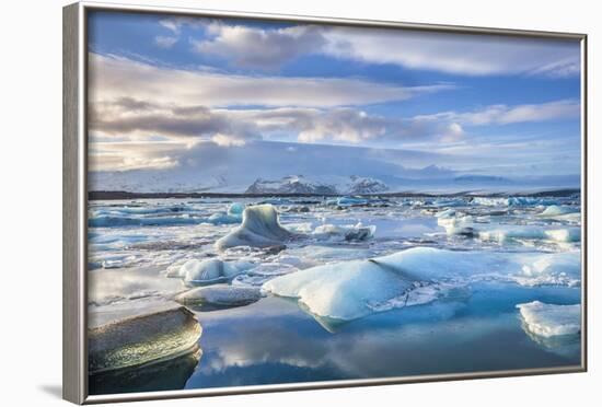 Mountains Behind Icebergs Locked in the Frozen Water of Jokulsarlon Lagoon-Neale Clark-Framed Photographic Print