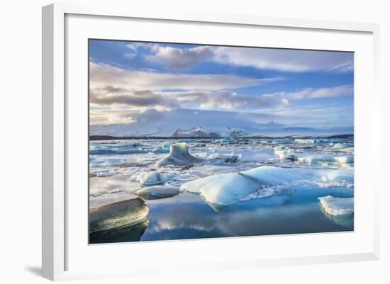 Mountains Behind Icebergs Locked in the Frozen Water of Jokulsarlon Lagoon-Neale Clark-Framed Photographic Print