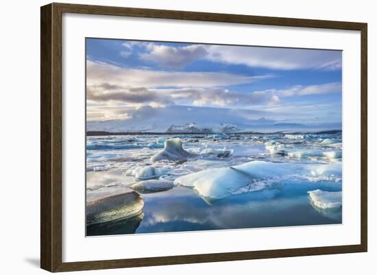 Mountains Behind Icebergs Locked in the Frozen Water of Jokulsarlon Lagoon-Neale Clark-Framed Photographic Print