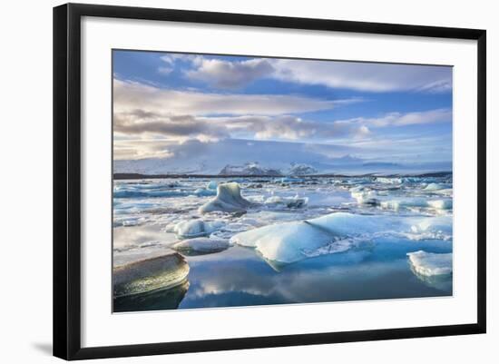 Mountains Behind Icebergs Locked in the Frozen Water of Jokulsarlon Lagoon-Neale Clark-Framed Photographic Print