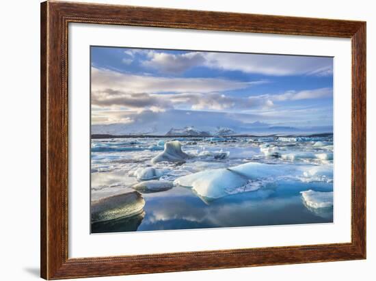 Mountains Behind Icebergs Locked in the Frozen Water of Jokulsarlon Lagoon-Neale Clark-Framed Photographic Print