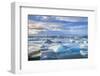 Mountains Behind Icebergs Locked in the Frozen Water of Jokulsarlon Lagoon-Neale Clark-Framed Photographic Print