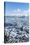 Mountains Behind the Frozen Water of Jokulsarlon Iceberg Lagoon, Jokulsarlon, South East Iceland-Neale Clark-Stretched Canvas