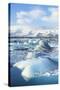 Mountains Behind the Icebergs Locked in the Frozen Water of Jokulsarlon Iceberg Lagoon-Neale Clark-Stretched Canvas