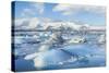 Mountains Behind the Icebergs Locked in the Frozen Water of Jokulsarlon Iceberg Lagoon-Neale Clark-Stretched Canvas