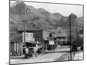 Mountains over Business District of Patman, Arizona-null-Mounted Photographic Print