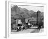 Mountains over Business District of Patman, Arizona-null-Framed Photographic Print