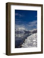 Mountains reflect in wintry Lake McDonald in Glacier National Park, Montana, USA-Chuck Haney-Framed Photographic Print