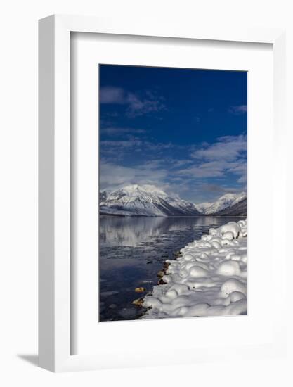 Mountains reflect in wintry Lake McDonald in Glacier National Park, Montana, USA-Chuck Haney-Framed Photographic Print