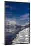 Mountains reflect in wintry Lake McDonald in Glacier National Park, Montana, USA-Chuck Haney-Mounted Photographic Print