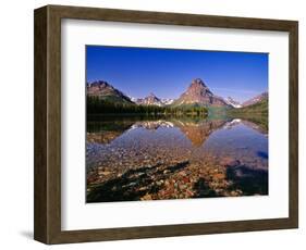 Mountains Reflect into Calm Two Medicine Lake, Glacier National Park, Montana, USA-Chuck Haney-Framed Photographic Print