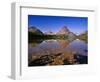 Mountains Reflect into Calm Two Medicine Lake, Glacier National Park, Montana, USA-Chuck Haney-Framed Photographic Print