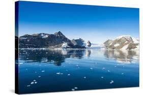 Mountains reflecting in glassy water of Hope Bay, Antarctica, Polar Regions-Michael Runkel-Stretched Canvas