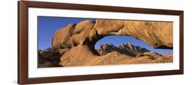 Mountains Viewed Through a Natural Arch with a Mother Holding Her Baby, Spitzkoppe, Namib Desert...-null-Framed Photographic Print