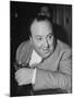 Movie Director Alfred Hitchcock Sits at Chasen's Bar While Enjoying a Cocktail Hour-Peter Stackpole-Mounted Premium Photographic Print