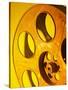 Movie Film and Reels in Yellow Light-null-Stretched Canvas