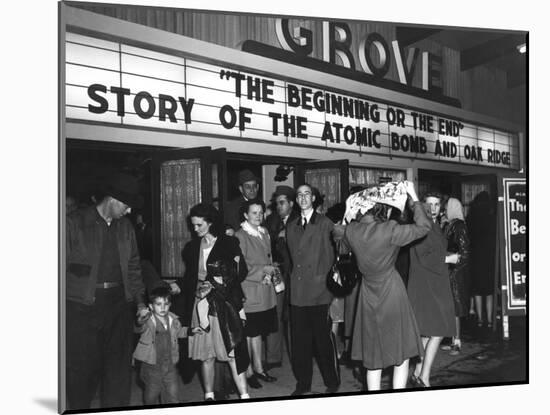 Movie Theater Marque Announcing a Movie, 'The Beginning or the End-null-Mounted Photo