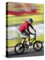 Moving Bicycle and Rider-null-Stretched Canvas