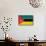 Mozambique Flag Design with Wood Patterning - Flags of the World Series-Philippe Hugonnard-Mounted Art Print displayed on a wall