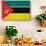 Mozambique Flag Design with Wood Patterning - Flags of the World Series-Philippe Hugonnard-Art Print displayed on a wall