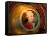 Mozart's Face on Chocolate Wrapper, Salzburg, Austria-David Barnes-Framed Stretched Canvas