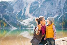 Happy Mother and Baby Making Selfie on Lake Braies in South Tyrol, Italy-Mr Alliance-Mounted Photographic Print