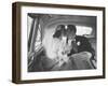 Mr. and Mrs. Thomas Beagan Jr. Kissing in Back of Car after their Wedding Ceremony-Ed Clark-Framed Premium Photographic Print