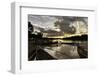 Mrauk U boat jetty at sunset showing waterlogged canoes in the foreground, Rakhine, Myanmar-Brian Graney-Framed Photographic Print