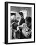 Mrs. Alfonso La Falce Kissing Baby Son at Family Reunion Dinner-Ralph Morse-Framed Photographic Print