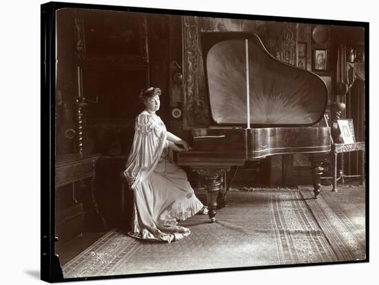 Mrs. I. M. Clark Seated at a Grand Piano, 1904-Byron Company-Stretched Canvas