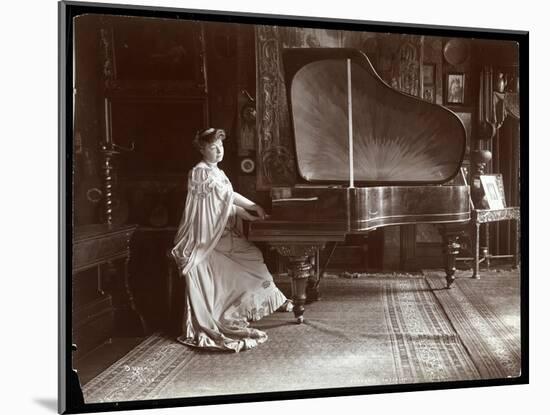 Mrs. I. M. Clark Seated at a Grand Piano, 1904-Byron Company-Mounted Giclee Print