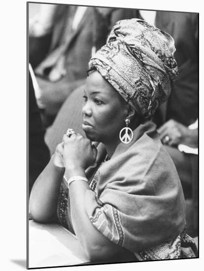 Mrs. Jeanne Martin Cisse, Wears Peace Symbol Earrings at the U.N. Security Council-null-Mounted Photo