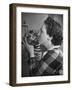 Mrs. Martini, Wife of the Bronx Zoo Lion Keeper, Kissing a Tiger Cub-Alfred Eisenstaedt-Framed Photographic Print