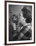 Mrs. Martini, Wife of the Bronx Zoo Lion Keeper, Kissing a Tiger Cub-Alfred Eisenstaedt-Framed Photographic Print