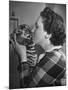 Mrs. Martini, Wife of the Bronx Zoo Lion Keeper, Kissing a Tiger Cub-Alfred Eisenstaedt-Mounted Photographic Print