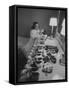 Mrs. Ottilie King Lining Up Her Children's Shoes-Stan Wayman-Framed Stretched Canvas