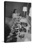 Mrs. Ottilie King Lining Up Her Children's Shoes-Stan Wayman-Stretched Canvas