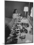 Mrs. Ottilie King Lining Up Her Children's Shoes-Stan Wayman-Mounted Photographic Print