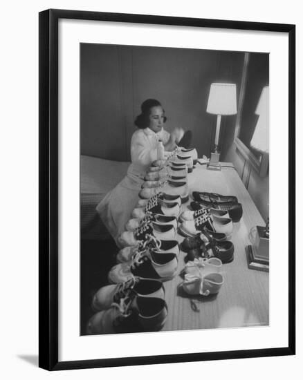 Mrs. Ottilie King Lining Up Her Children's Shoes-Stan Wayman-Framed Photographic Print