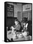Mrs. Robert Neve and Son Peter Eating Supper in Restaurant-Hans Wild-Framed Stretched Canvas