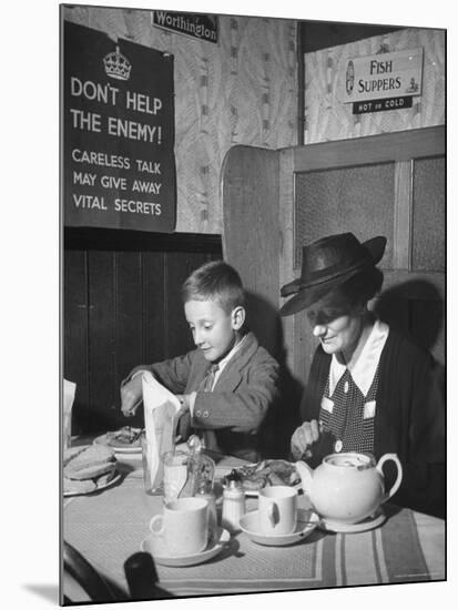 Mrs. Robert Neve and Son Peter Eating Supper in Restaurant-Hans Wild-Mounted Photographic Print