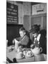 Mrs. Robert Neve and Son Peter Eating Supper in Restaurant-Hans Wild-Mounted Photographic Print