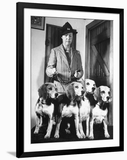 Mrs. William Dupont Jr. Holding Reins of Four Beagles That Belonged to Her Late Husband-Hansel Mieth-Framed Photographic Print