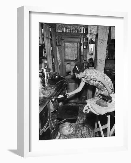 Mrs. Yandle Cooking on Coal Stove, Yacolt Mt, Future Recipients of Electricity from Bonneville Dam-Alfred Eisenstaedt-Framed Photographic Print