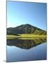 Mt. Aso reflected in a calm lake, Kumamoto Prefecture, Japan-null-Mounted Photographic Print