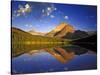 Mt Wilbur Reflects into Fishercap Lake, Many Glacier Valley of Glacier National Park, Montana, USA-Chuck Haney-Stretched Canvas