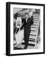 Muhammad Ali, Waves from the Steps of a TWA Airplane at JFK Airport, NYC, 1964-null-Framed Photo